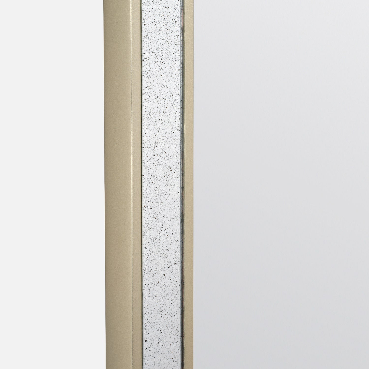 Close-up of a door frame with a textured panel and beige trim.