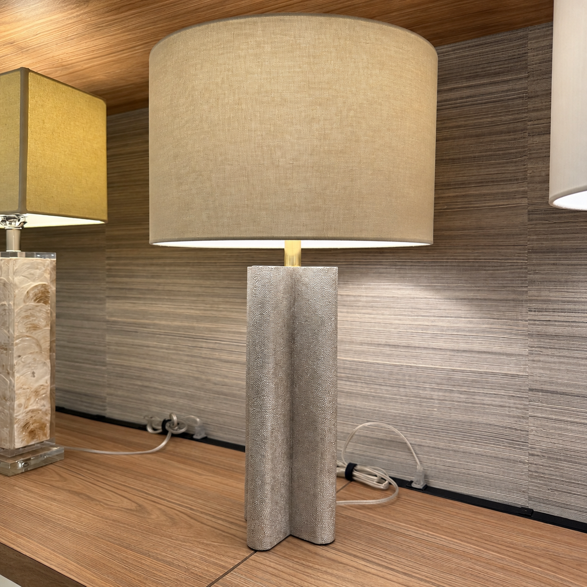 warm silver table lamp in a showroom