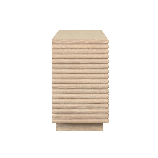 Stack of beige folded towels on a white background
