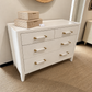 Fergus 48" Dresser White Raffia in a showroom