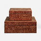 two stacked rectangular storage boxes with a textured brown and beige animal-print pattern, photographed against a clean white background.
