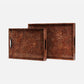 Two rectangular serving trays with a textured brown and beige animal-print pattern, featuring cutout handles on the sides, shown on a light gray background.