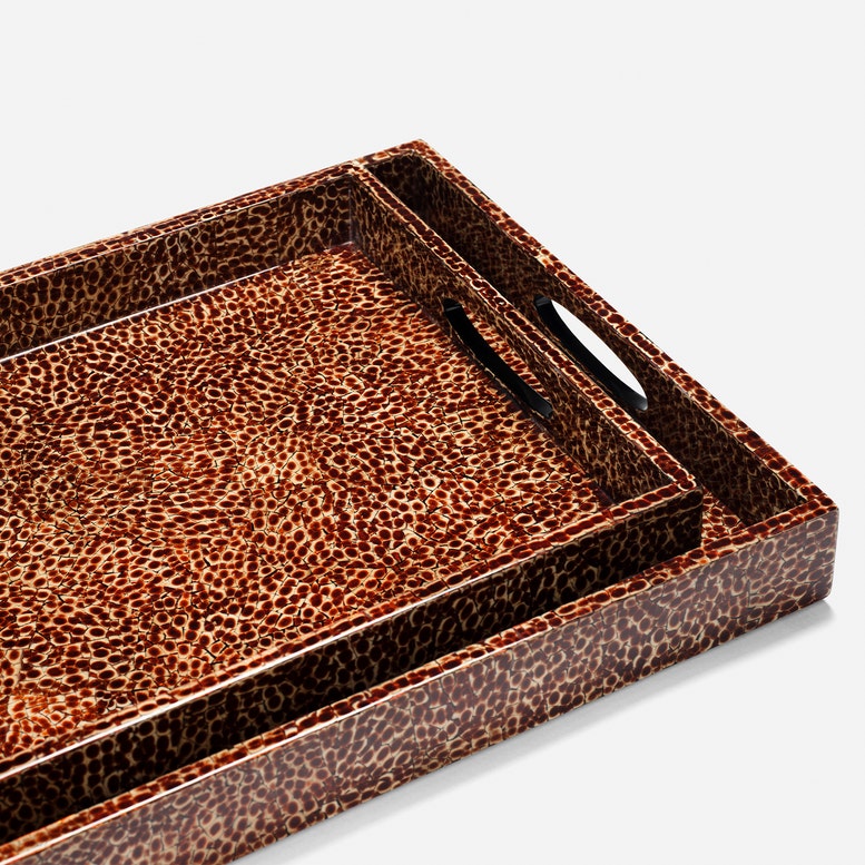 A rectangular serving tray with a glossy brown and black leopard print pattern, featuring integrated oval cutouts in the sides as handles, shown on a light gray background.
