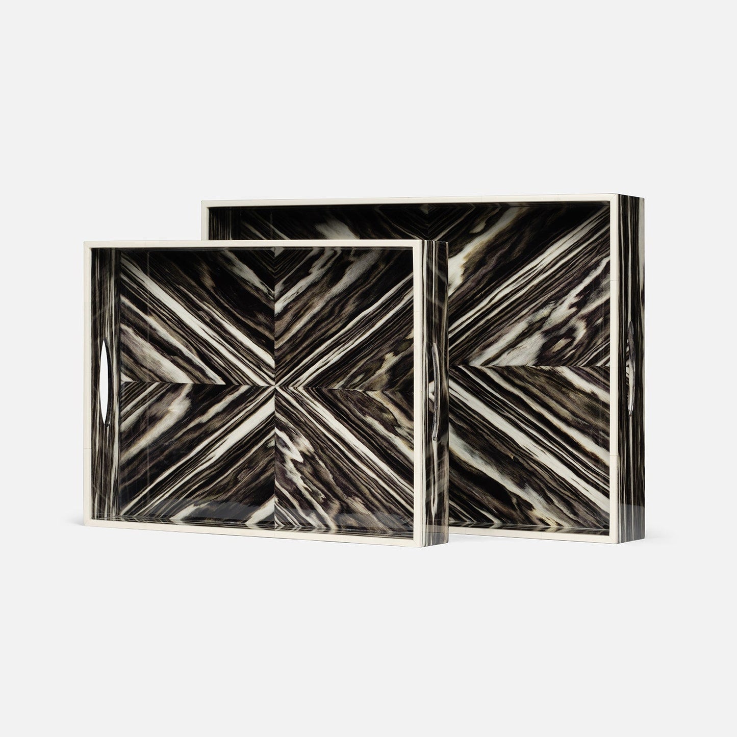Two decorative boxes with a marble-like pattern on a white background