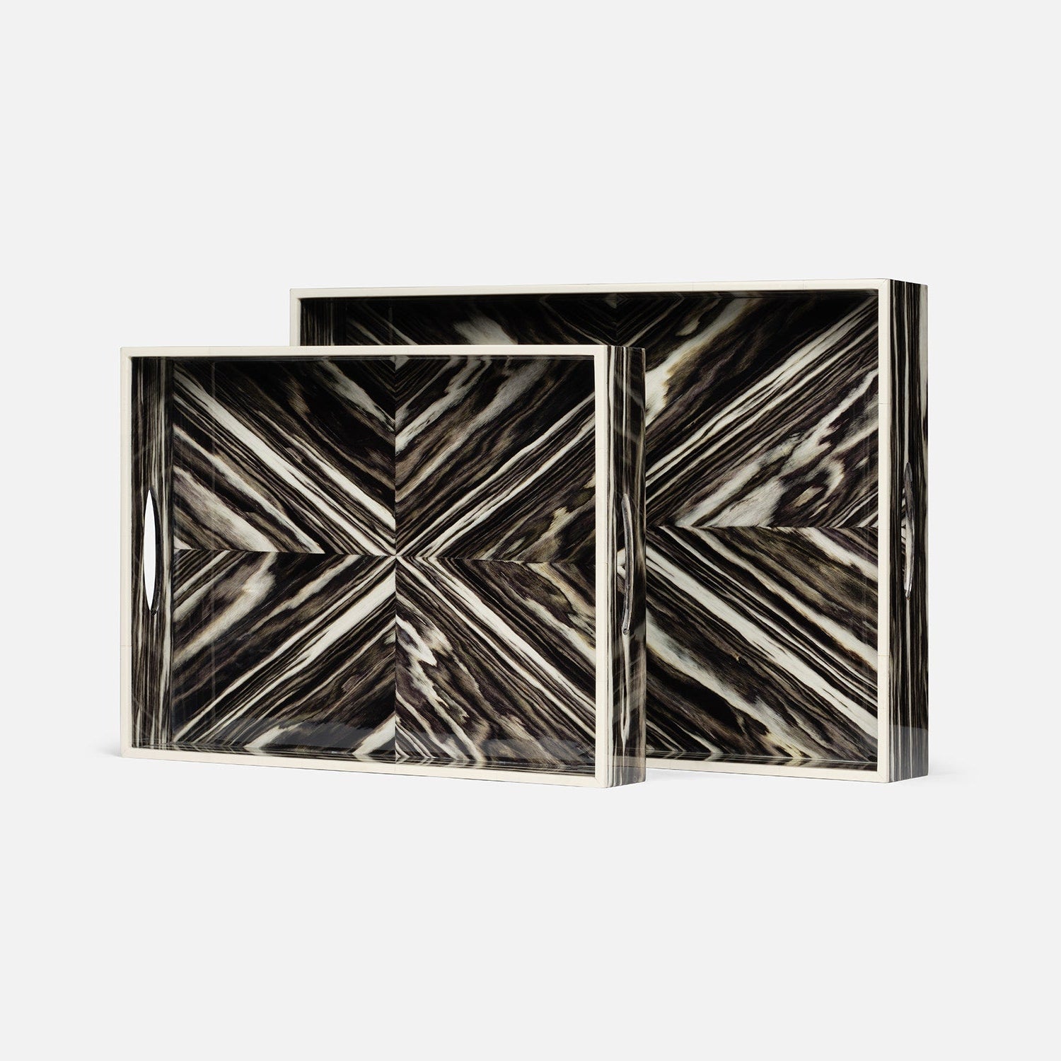 Two decorative boxes with a marble-like pattern on a white background