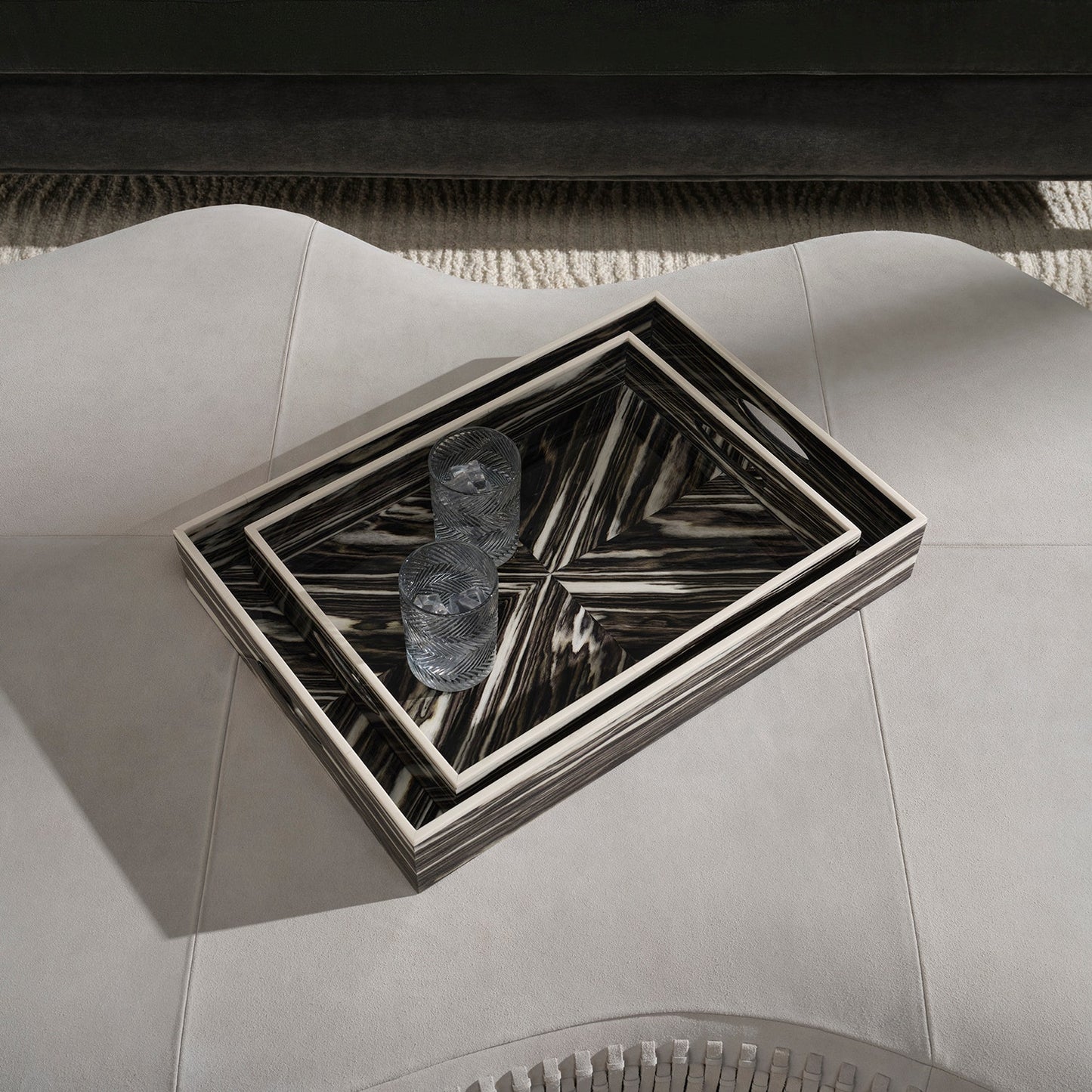 Decorative tray with geometric pattern on a gray surface