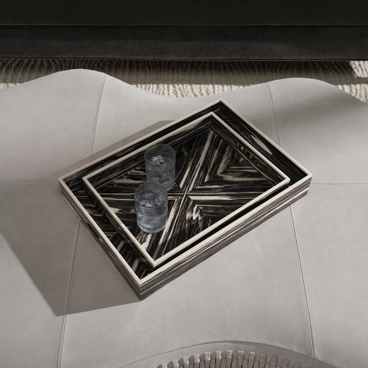 Decorative tray with geometric pattern on a gray surface