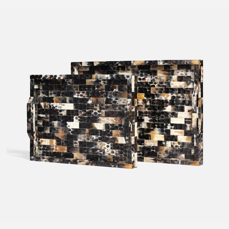 Two rectangular trays with handles, featuring a mosaic tile pattern in black, brown, beige, and white, displayed on a light gray background.