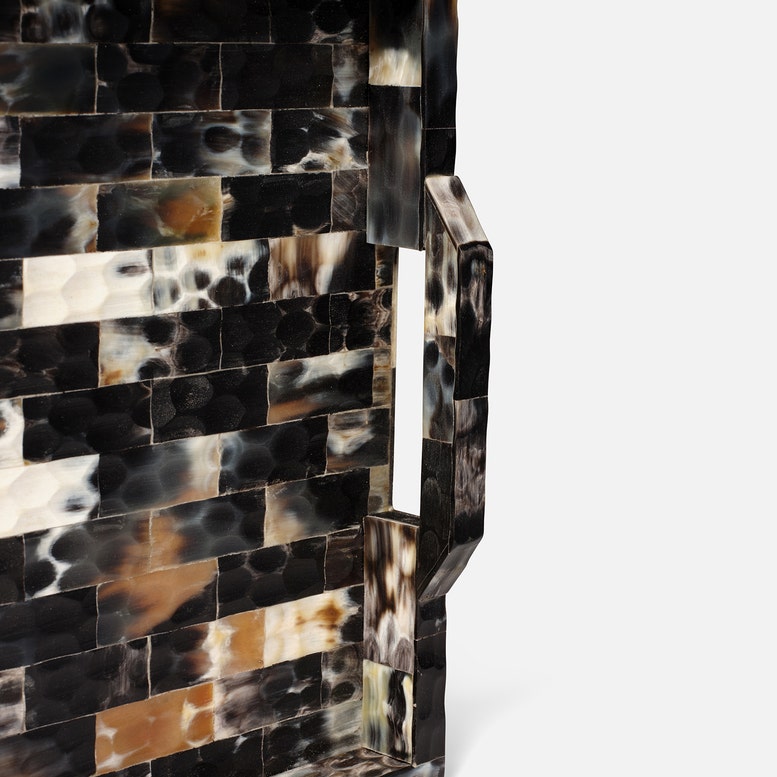 Decorative wall piece with tortoiseshell pattern on a white background