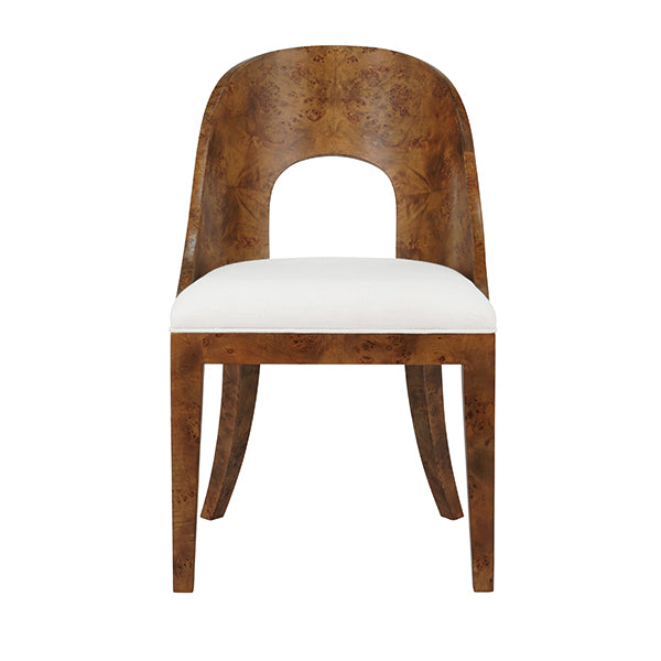 Wooden chair with a white cushion on a white background