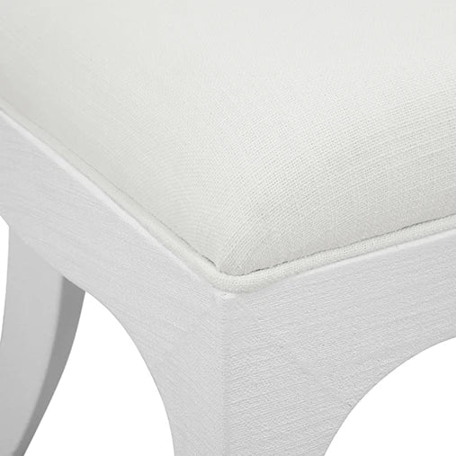 Close-up of a white chair with a cushioned seat on a white background