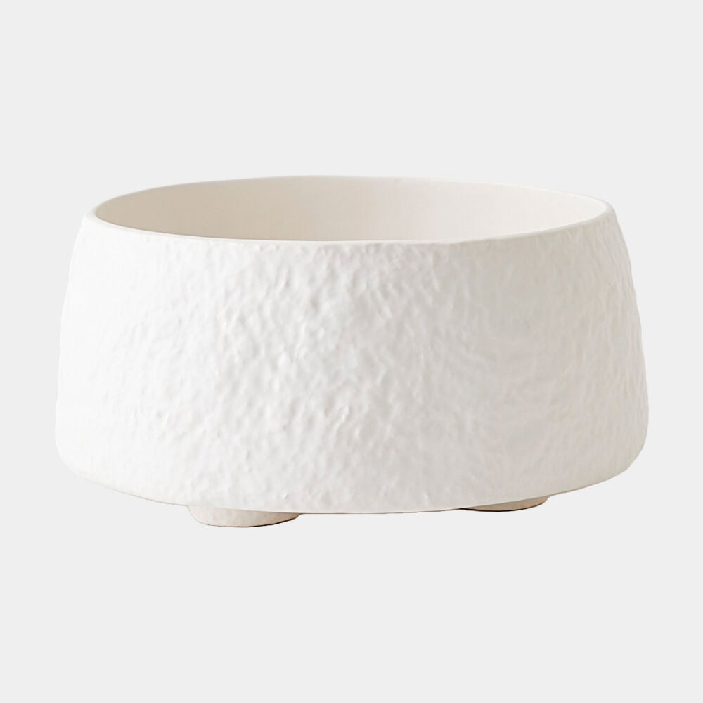 White textured ceramic bowl on a white background