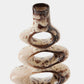 Ceramic spiral vase with brown speckles on a white background