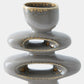 A ceramic sculptural vase with a stacked, tiered design featuring a small rounded top, a wide middle oval ring, and a larger bottom oval ring, all in a glossy gray glaze with metallic gold speckled accents, shown against a plain white background.