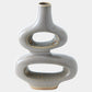 A modern, sculptural ceramic vase with a glossy light gray glaze and textured, speckled metallic gold-brown accents along the inner edges of its two interlocking oval rings, set against a plain light gray background.