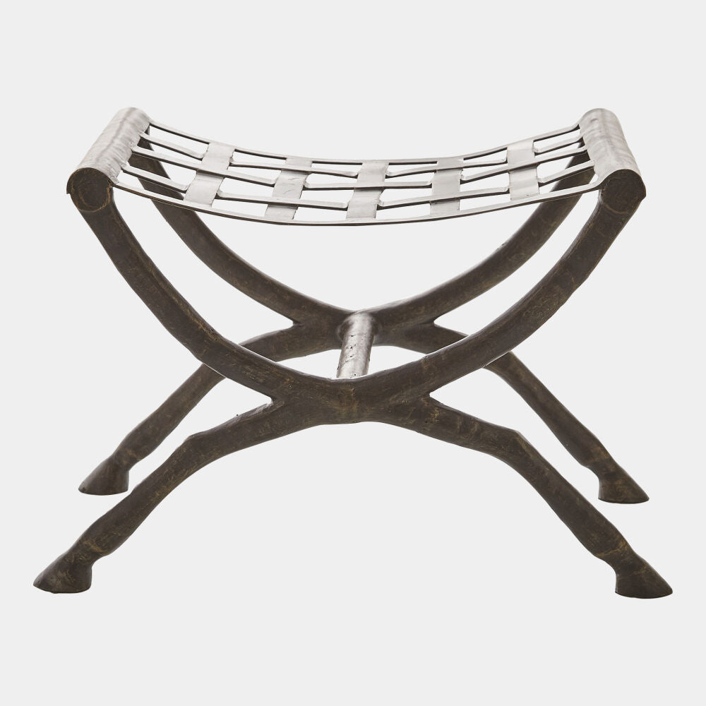 Metal stool with woven seat on a white background