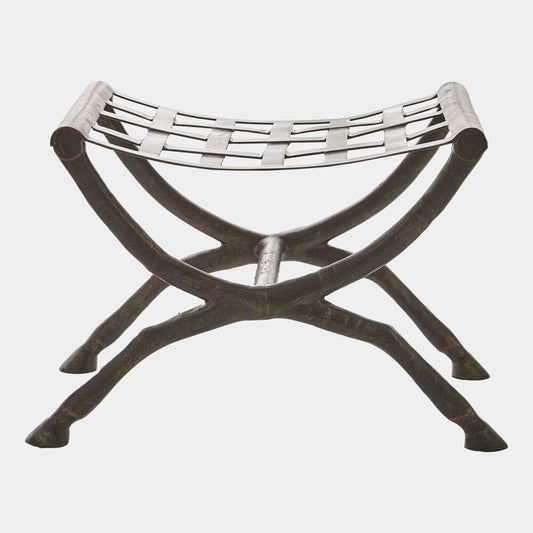 Metal stool with woven seat on a white background