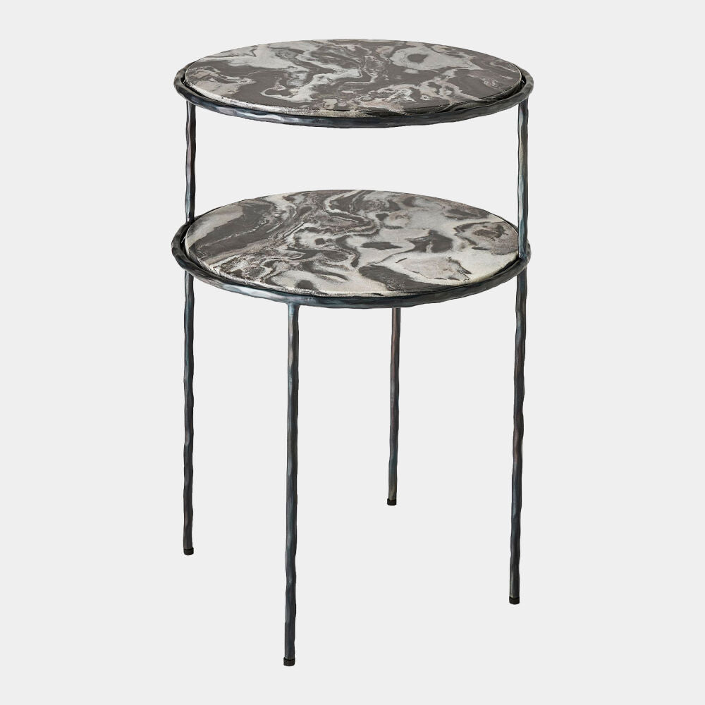 A two-tier nesting side table with round marble-patterned tops in gray, black, and white, supported by a twisted black metal frame and legs, shown on a light gray background.