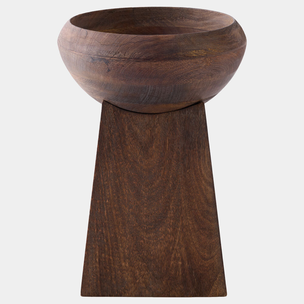 Wooden bowl on a wooden pedestal against a white background