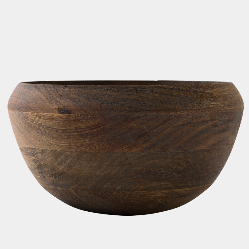 A dark brown wooden bowl with visible natural wood grain patterns, photographed against a solid light gray background.