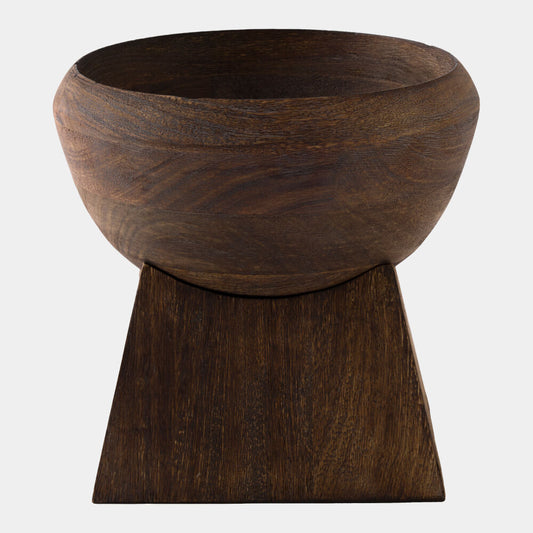 A dark brown wooden bowl with a matching geometric pedestal base, shown against a plain light gray background.