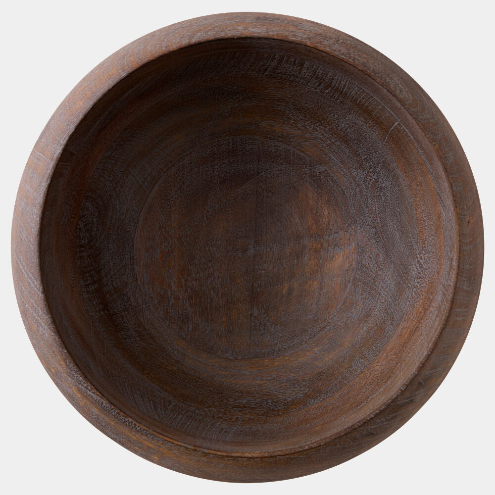 A round dark brown wooden bowl with a visible natural wood grain pattern, photographed from directly above on a light gray background.