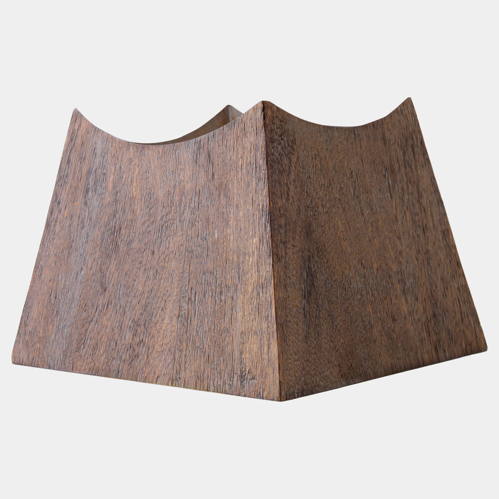 A dark brown wooden lampshade with a wavy, scalloped top edge and visible natural wood grain texture, shown on a plain light gray background.
