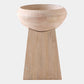 Wooden bowl on a stand with a plain background