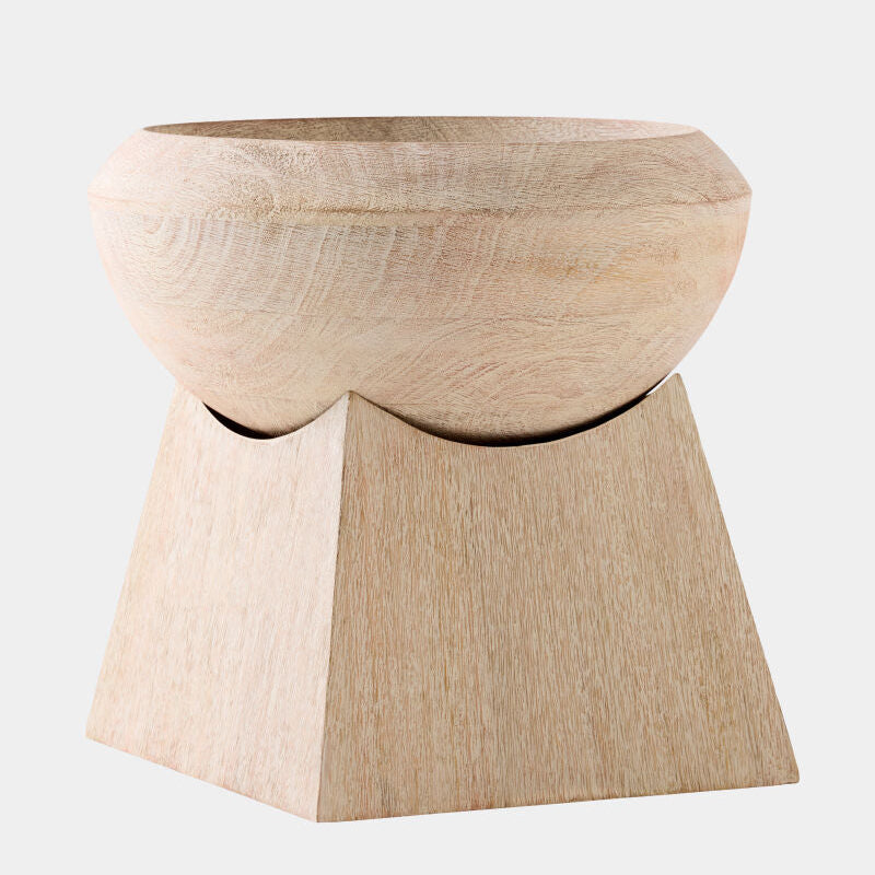 Wooden stool with a bowl-like top on a white background