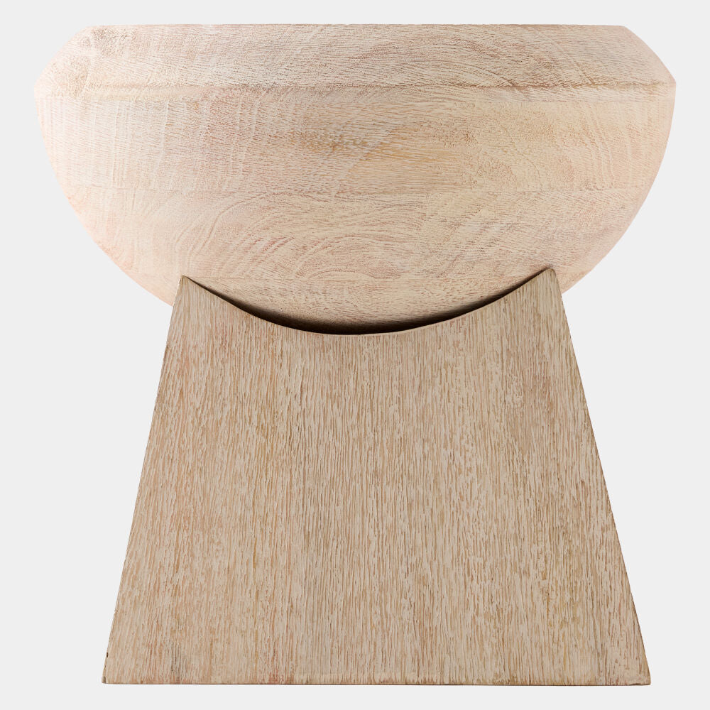 A light natural wood pedestal stool with a rounded bowl-shaped seat and a tapered rectangular base, shown against a plain light gray background.