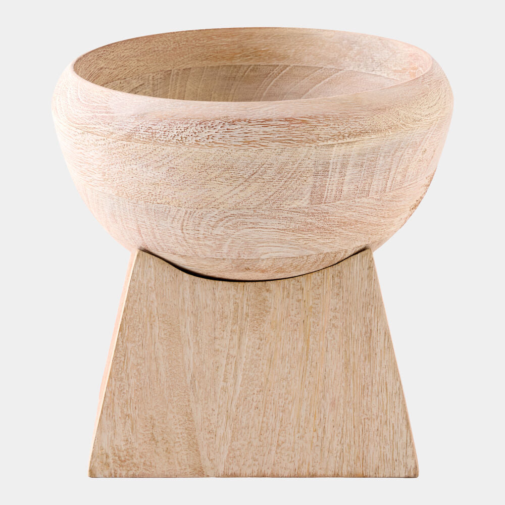 Wooden bowl on a wooden stand with a light background