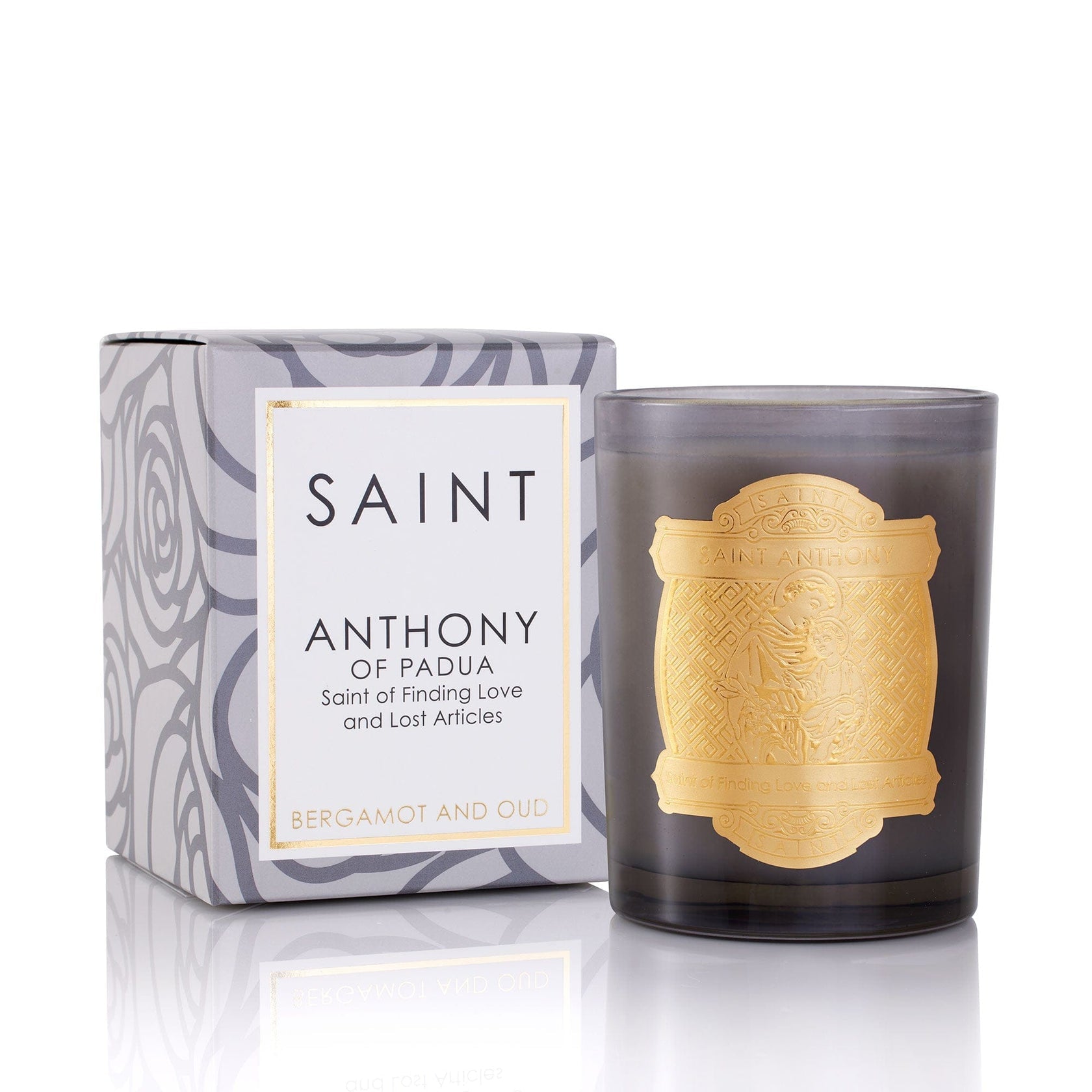 Candle with gold design and packaging labeled 'Saint Anthony of Padua' on a white background