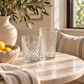 clear glass drinkware styled on a kitchen nook table