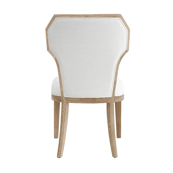 Chair with white cushioned backrest and seat on a white background
