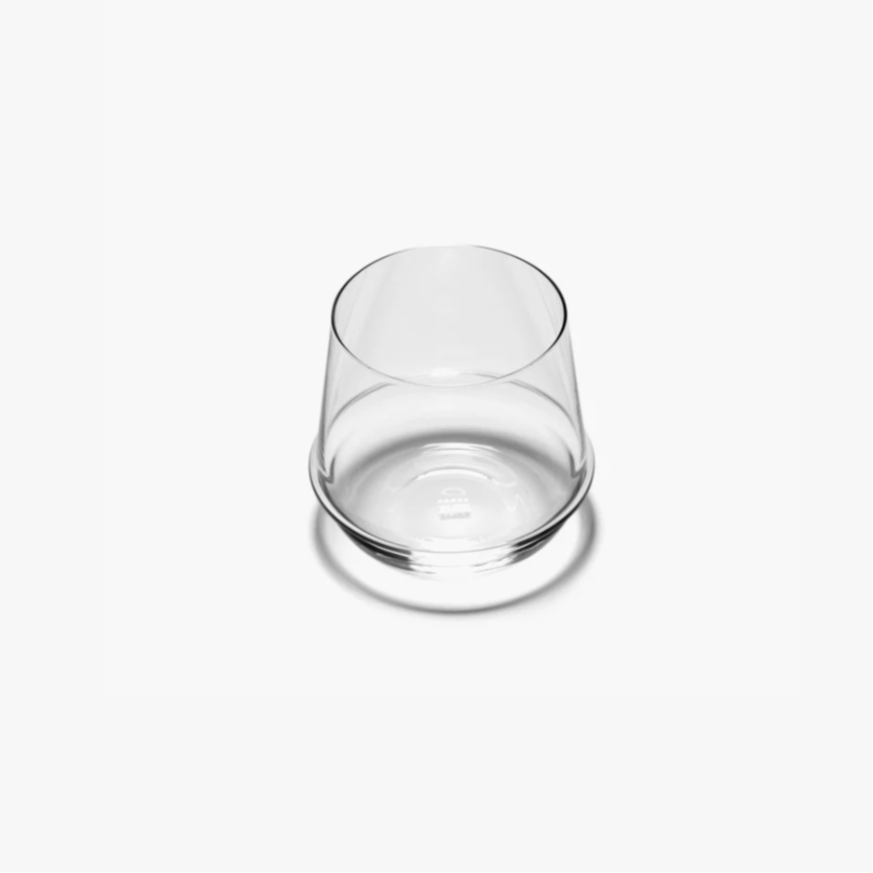Clear glass tumbler on a white background