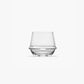 Clear glass tumbler on a white background