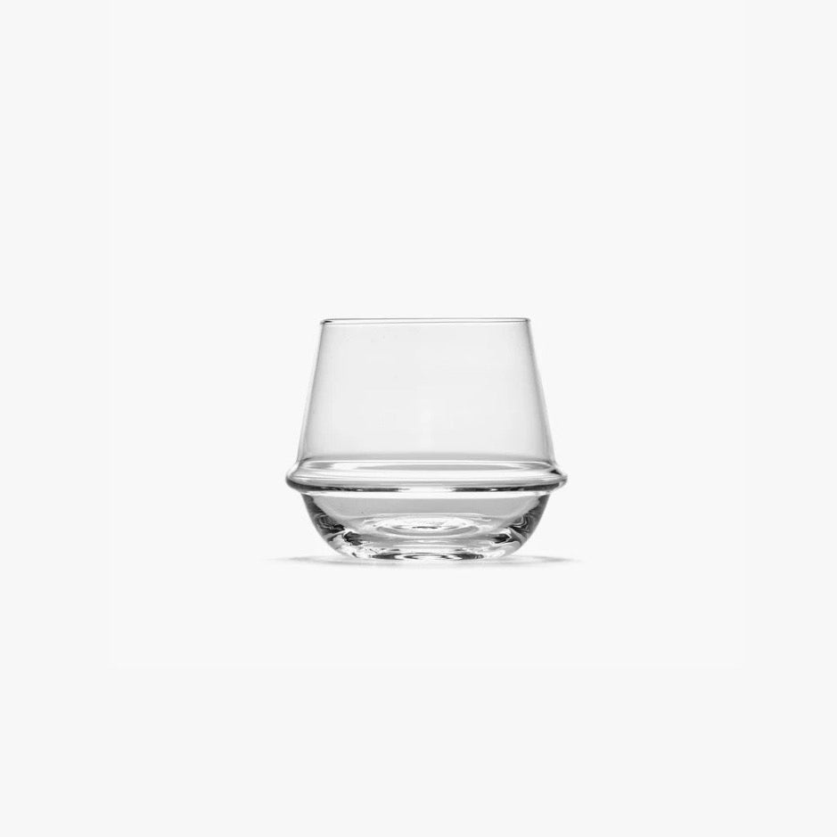 Clear glass tumbler on a white background