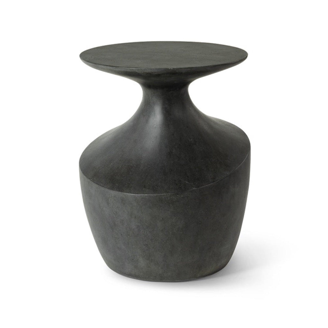 Black stone side table on a white background