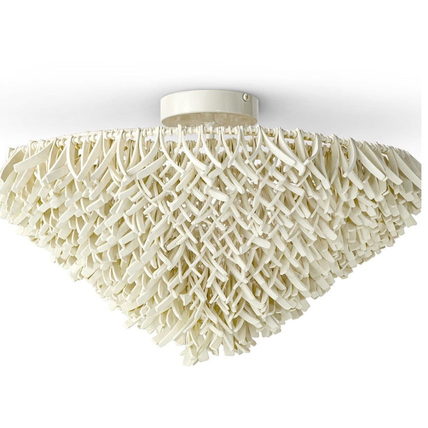 Decorative ceiling light fixture with a textured, coral-like design on a white background