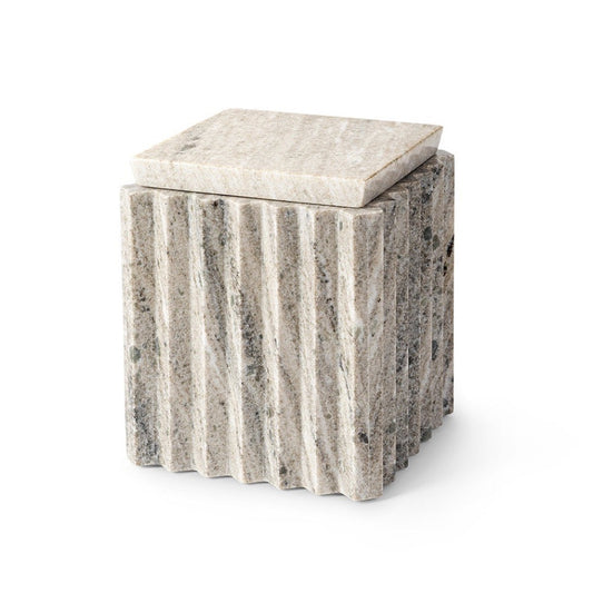 Marble-patterned cube-shaped ottoman on a white background