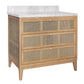 Wooden vanity with marble countertop and rattan-style drawers on a white background