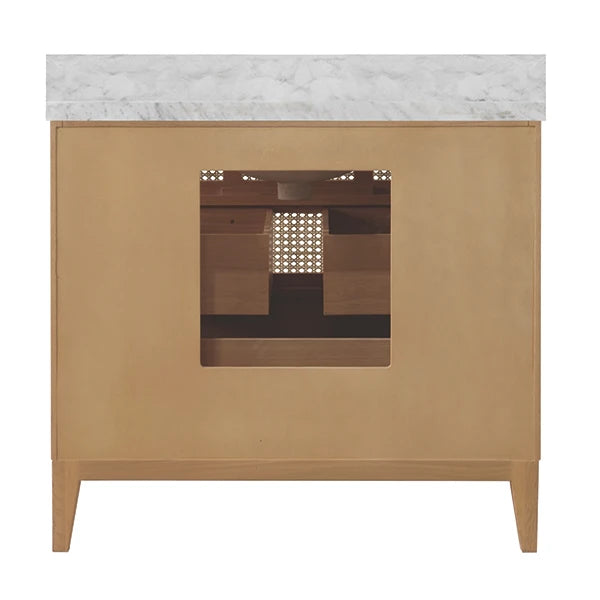A modern single-basin vanity cabinet with a light natural wood finish and a white marble countertop, shown against a plain white background.