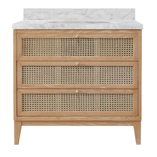 Wooden vanity with rattan drawers and marble countertop on a white background