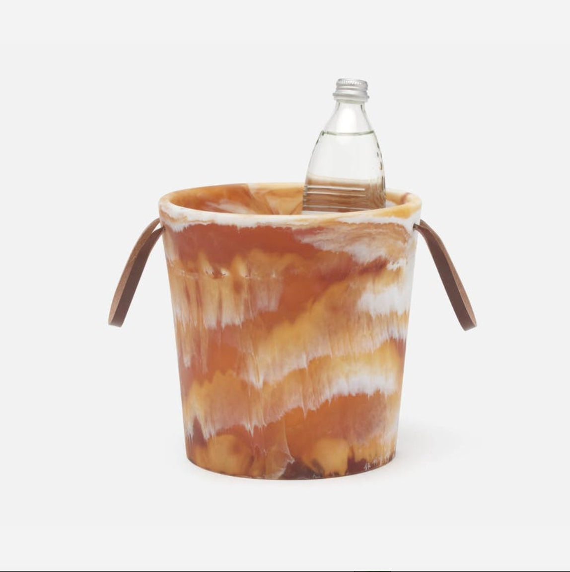 blue pheasant Wesley ice bucket with a marble pattern holding a clear bottle on a white background
