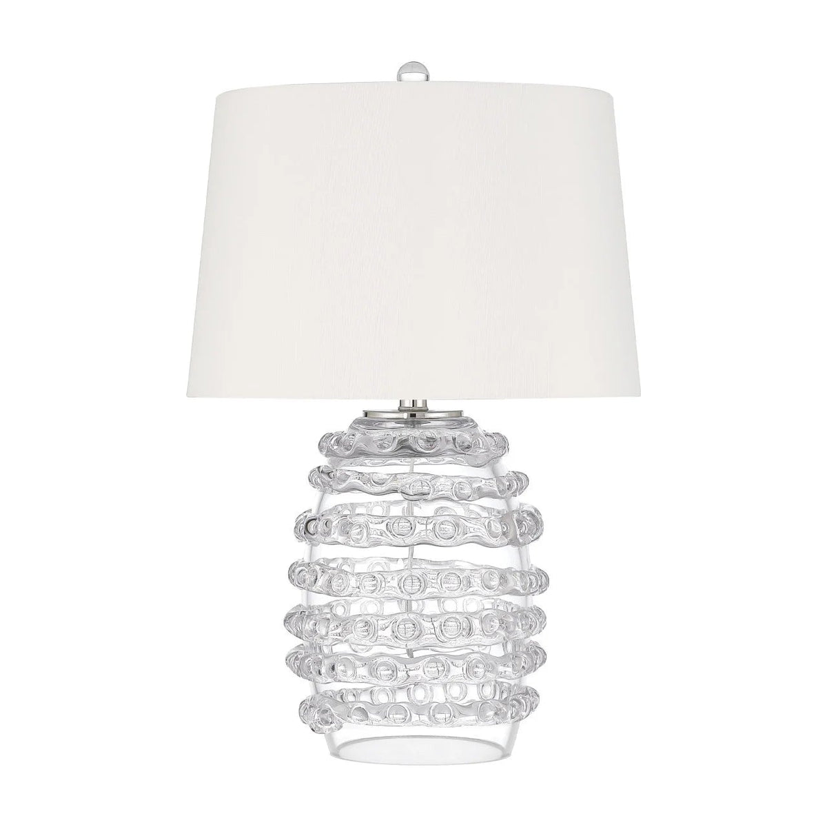 A table lamp with a white fabric drum shade and a clear ribbed glass base, shown against a plain white background.