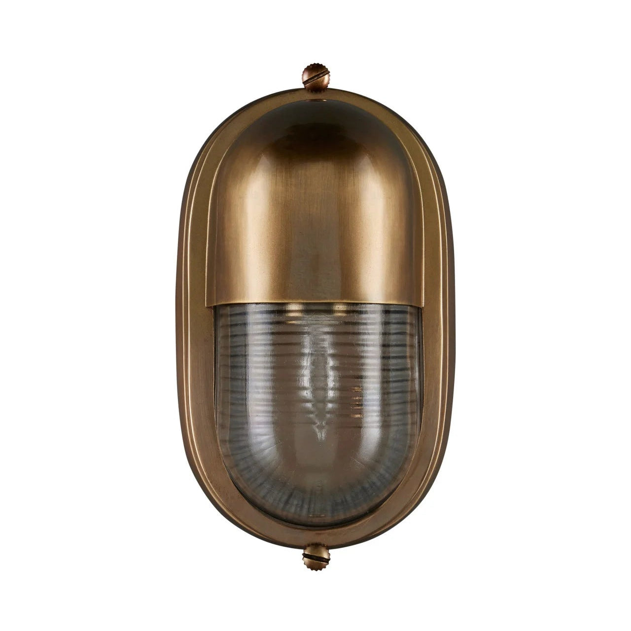 A wall-mounted light fixture with an oval, dome-shaped brass-toned metal body and a ribbed clear glass shade, shown against a plain white background.