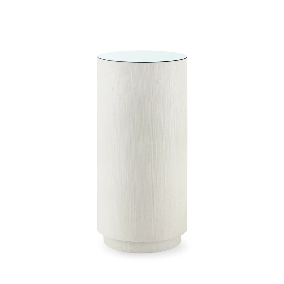 A modern cylindrical side table with a brushed white or off-white wood-grain finish and a clear glass top, shown on a solid white background.