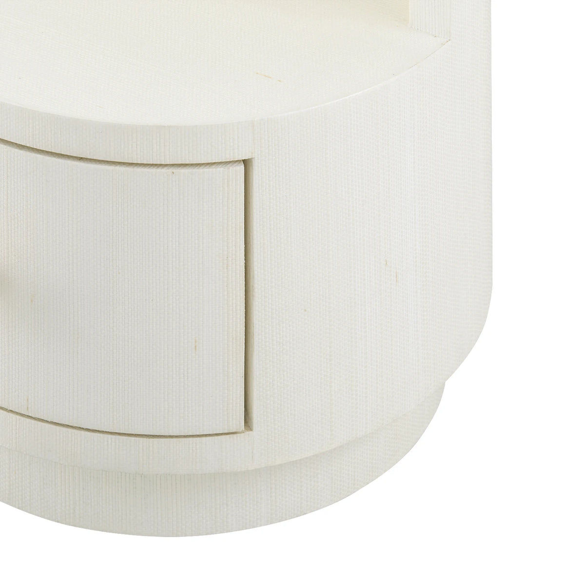 Close-up of a white lampshade with a subtle pattern on a white background