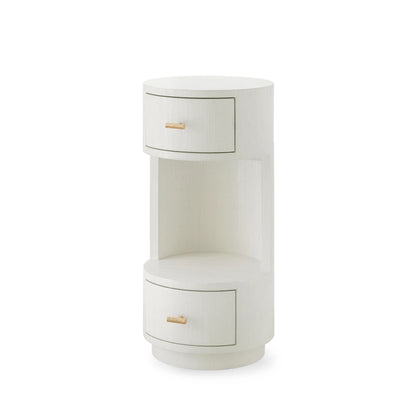 White cylindrical side table with gold accents on a white background
