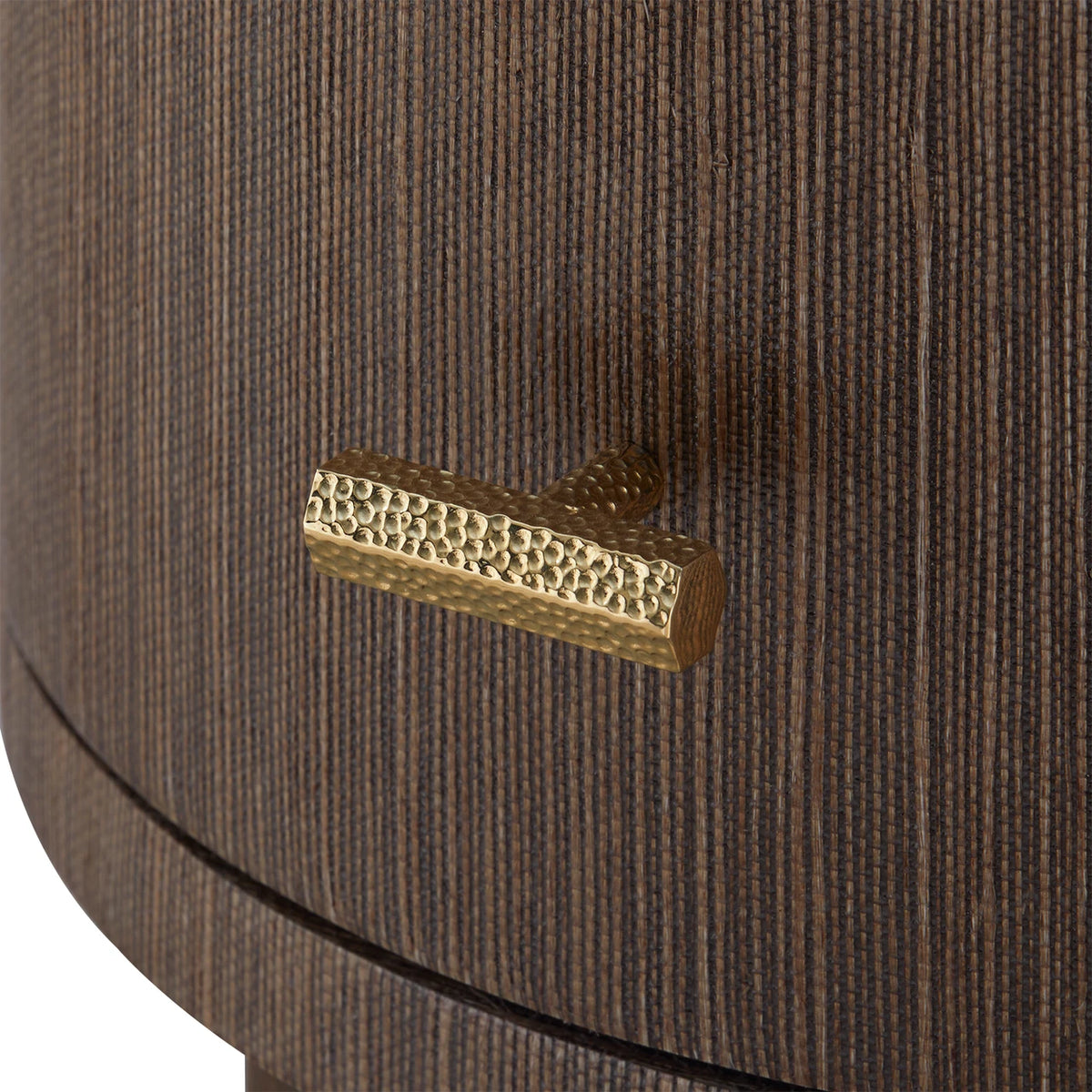 Close-up of a brown textured surface with a gold decorative element.